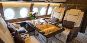 flying on a private jet beige interior